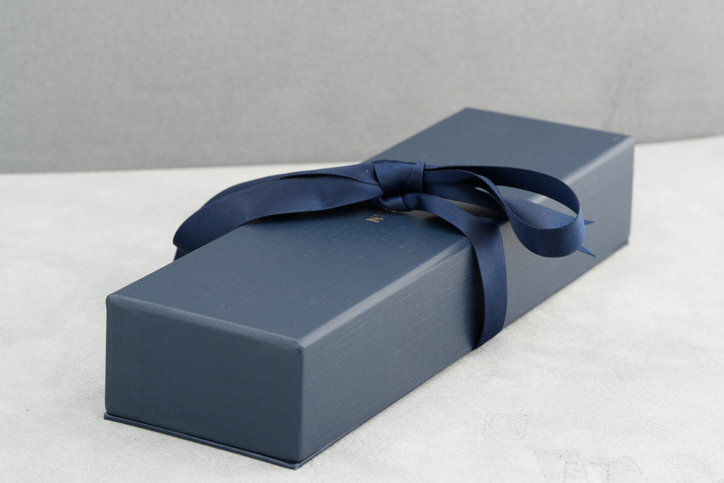 Chapman Gold navy presentation box with ribbon