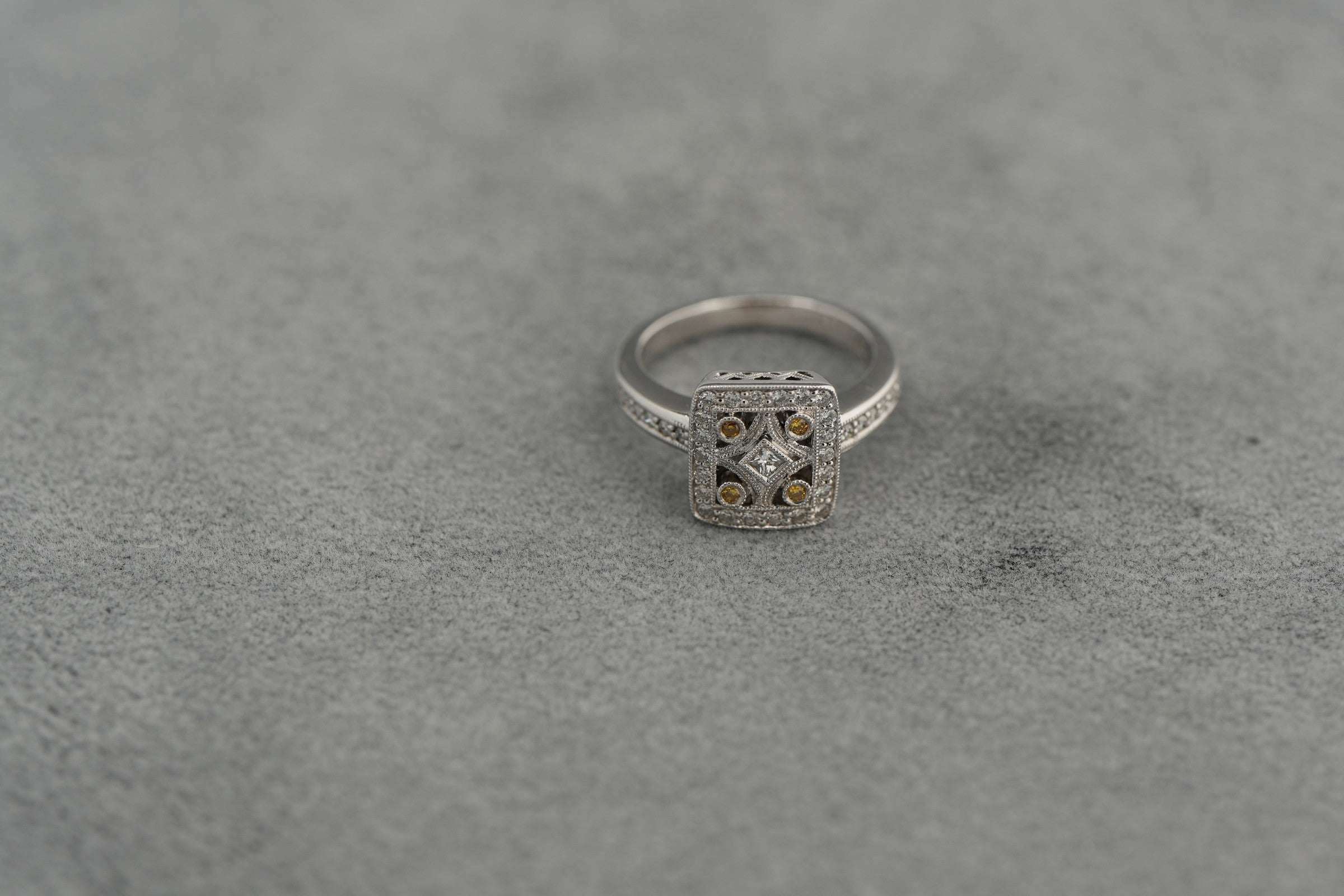 V and Co 18ct white gold Art Deco diamond panel ring, size M and a half