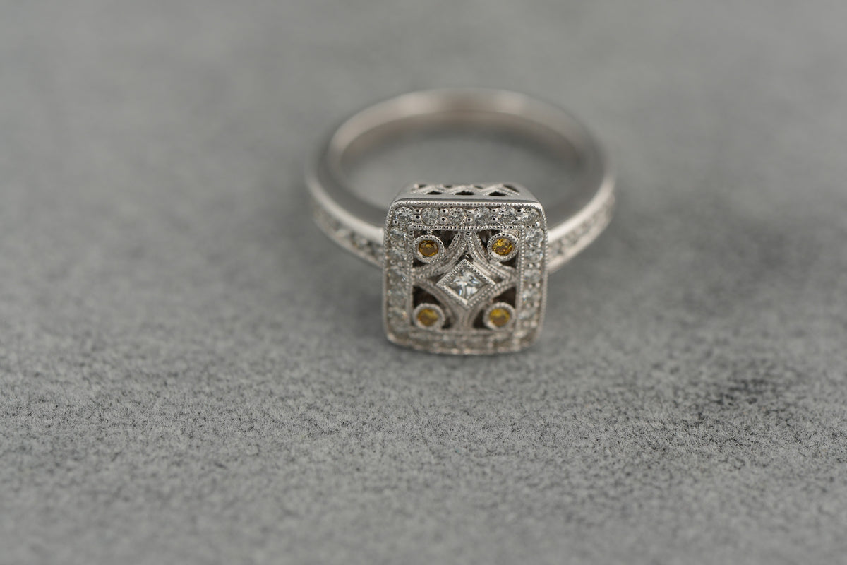 V and Co 18ct white gold Art Deco diamond panel ring, size M and a half