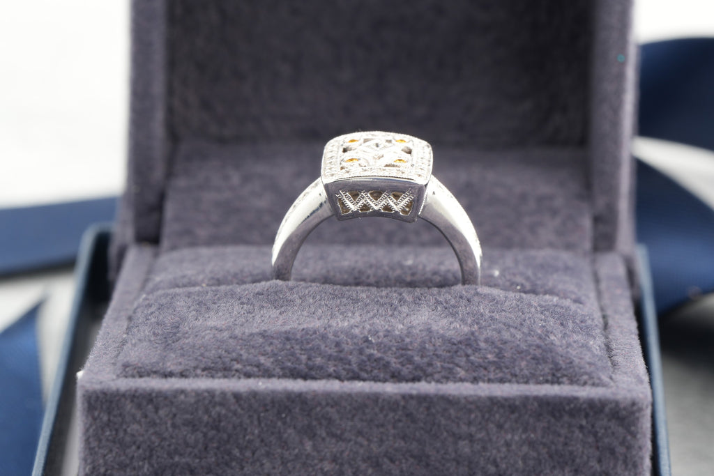 V and Co 18ct white gold Art Deco diamond panel ring, size M and a half