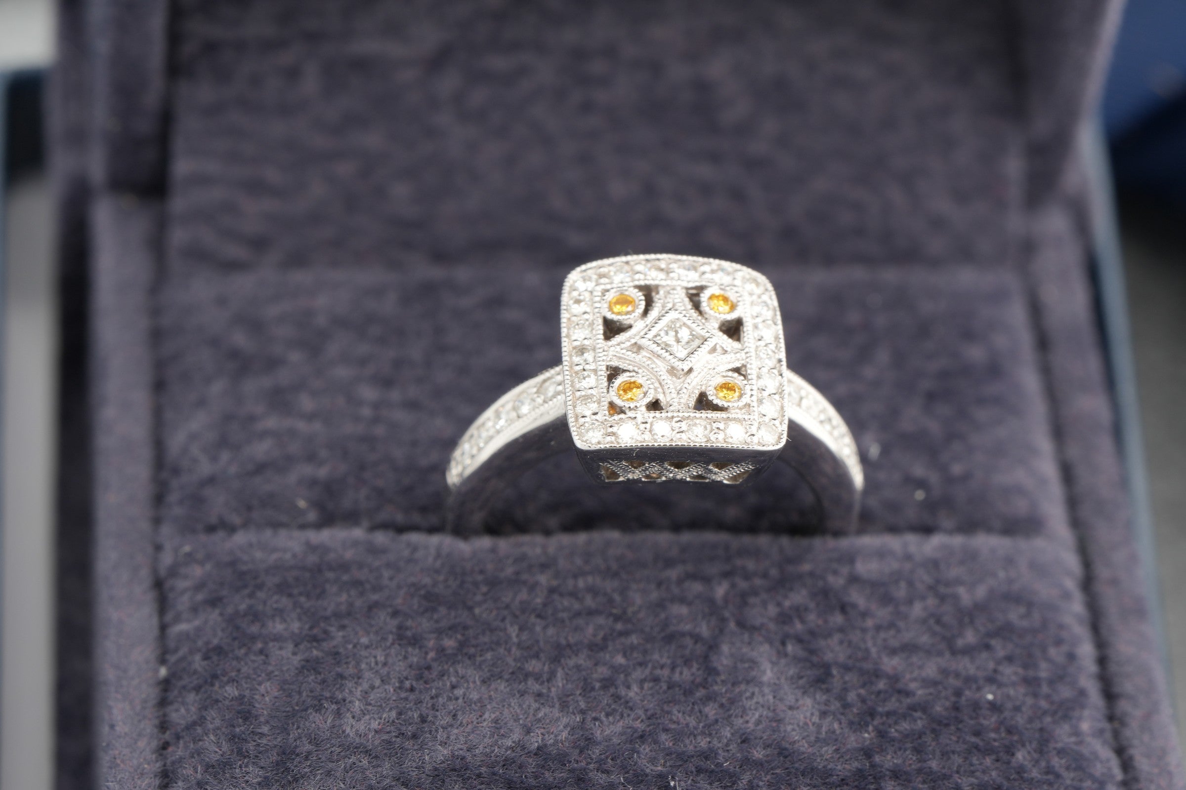 V and Co 18ct white gold Art Deco diamond panel ring, size M and a half