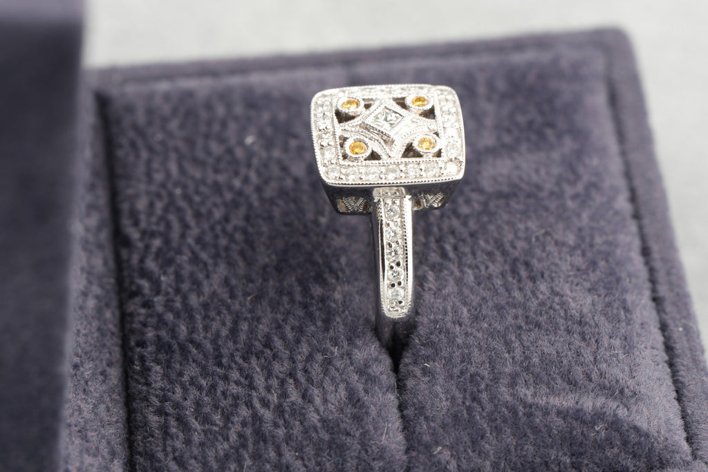 V and Co 18ct white gold Art Deco diamond panel ring, size M and a half