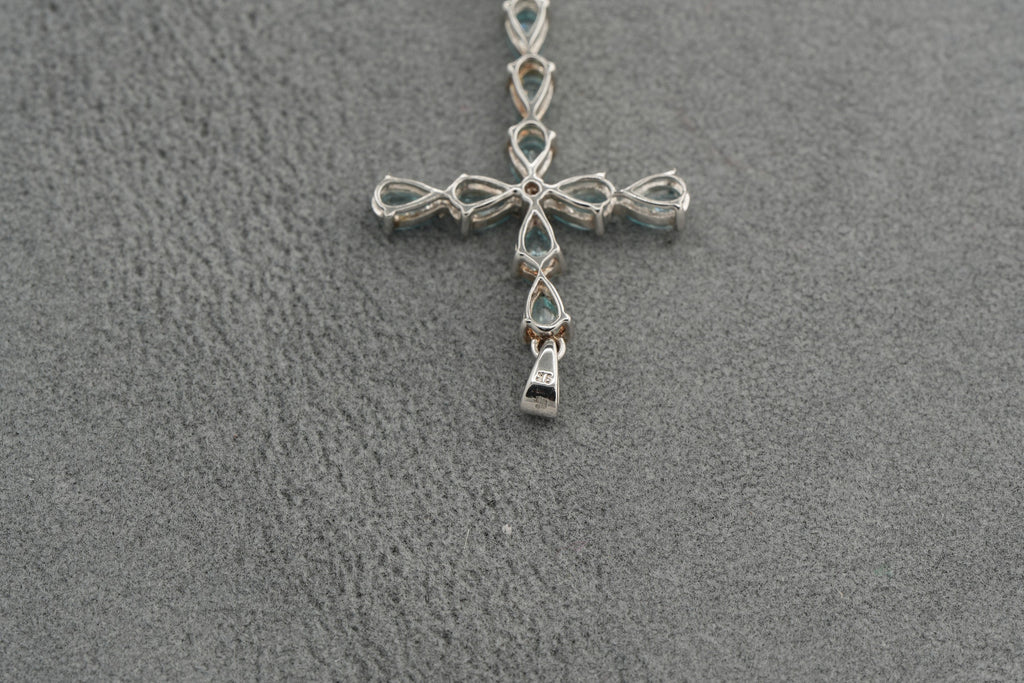 9ct white gold London blue topaz cross pendant