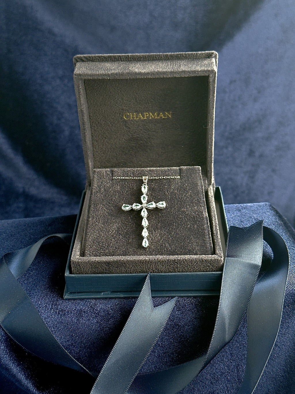 9ct white gold sky blue topaz cross pendant, hallmarked (display chain not included)