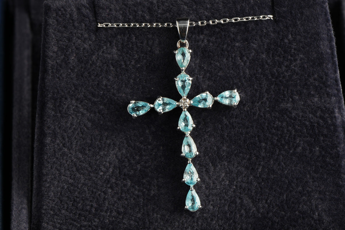 9ct white gold sky blue topaz cross pendant, hallmarked (display chain not included)