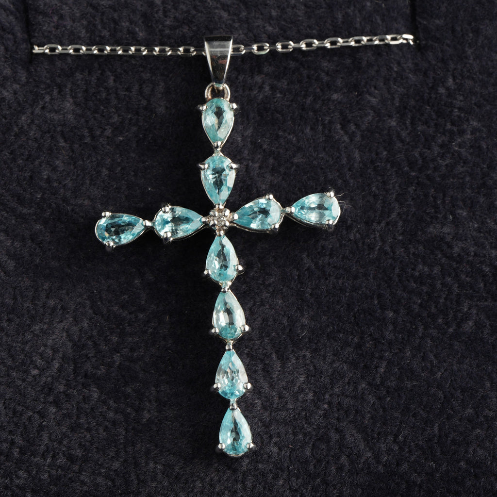 9ct white gold sky blue topaz cross pendant, hallmarked (display chain not included)
