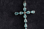 9ct white gold sky blue topaz cross pendant, hallmarked (display chain not included)