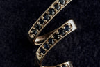 9ct gold spiral scarf slide, dark blue stones, Birmingham hallmarked