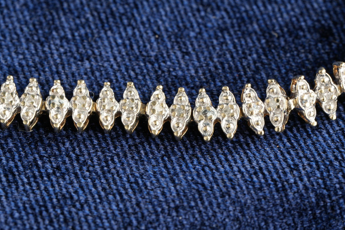 9ct gold diamond line bracelet, 68 brilliants, Sheffield hallmarked, 19.5 cm