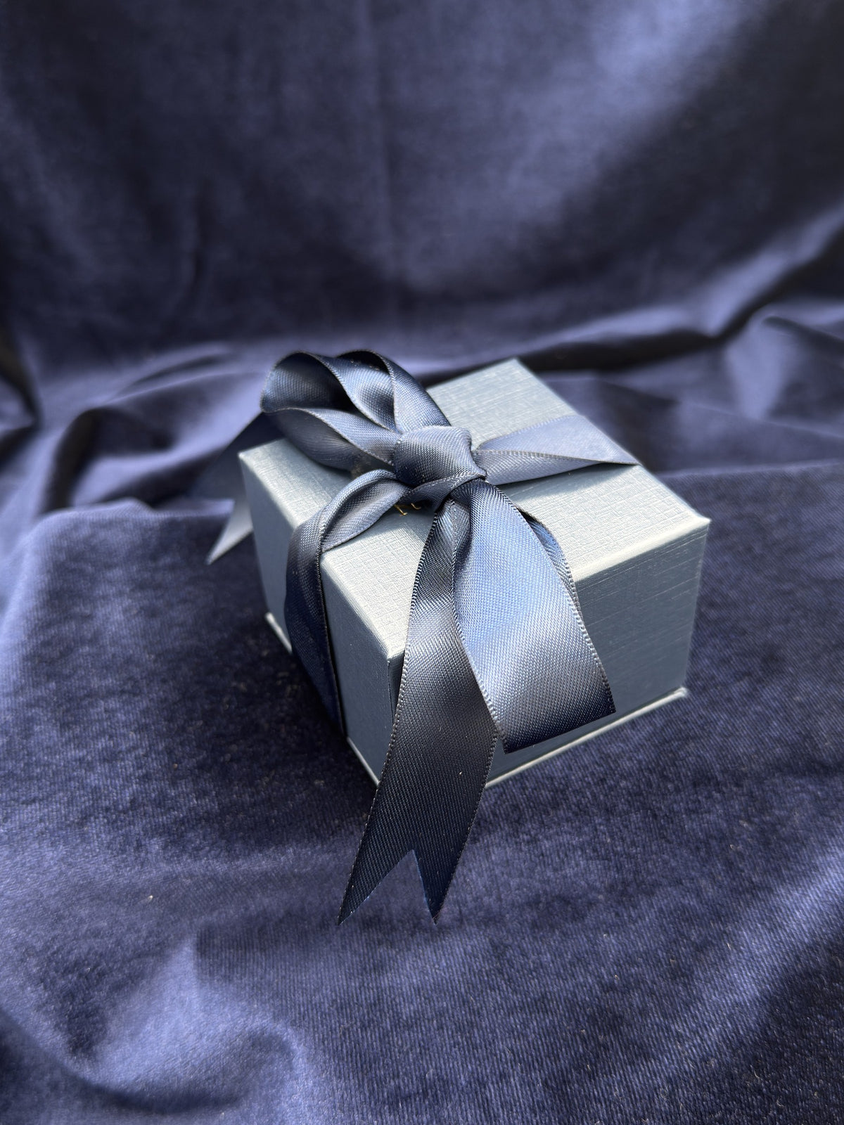Chapman Gold navy presentation box with ribbon