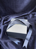 Chapman Gold navy presentation box with ribbon