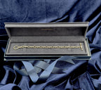 14ct yellow gold hay bale link bracelet with T-bar, 19.5 cm, hallmarked