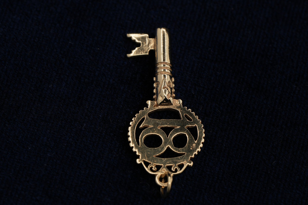 Solid 9ct yellow gold 18th birthday key charm, hallmarked