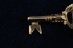 Solid 9ct yellow gold 18th birthday key charm, hallmarked