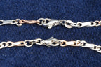 9ct rose and white gold curb and bar link necklace and bracelet set, London hallmarked