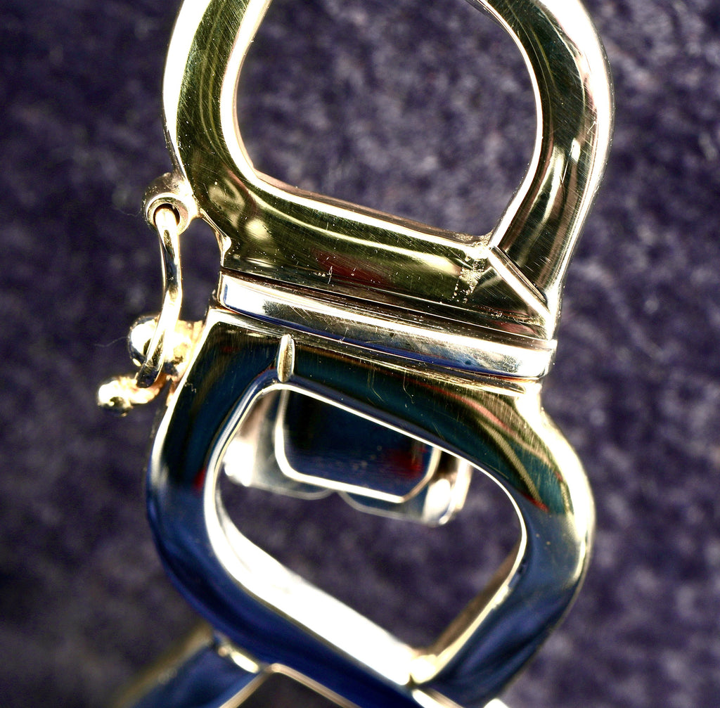 Pobjoy 9ct yellow and white gold hinged openwork bangle, 18.17 g, Sheffield hallmarked