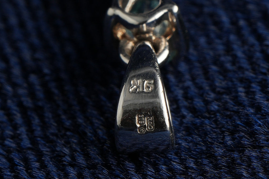 9ct white gold sky blue topaz cross pendant, hallmarked (display chain not included)