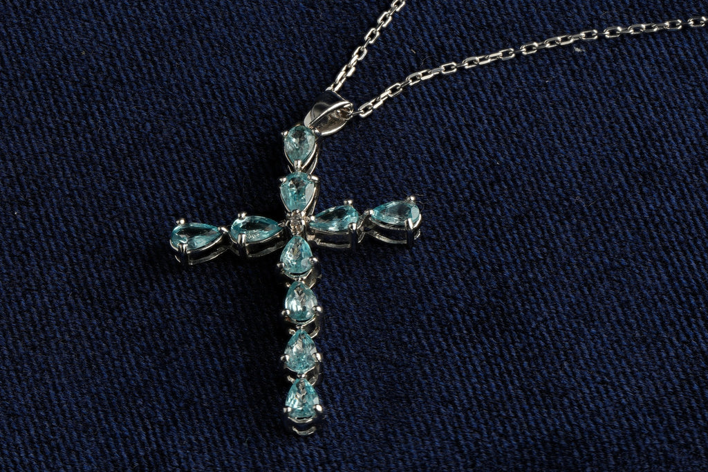 9ct white gold sky blue topaz cross pendant, hallmarked (display chain not included)