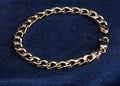 Solid 9ct yellow gold curb bracelet, 18.5 cm, hallmarked