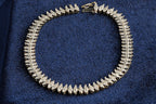 9ct gold diamond line bracelet, 68 brilliants, Sheffield hallmarked, 19.5 cm