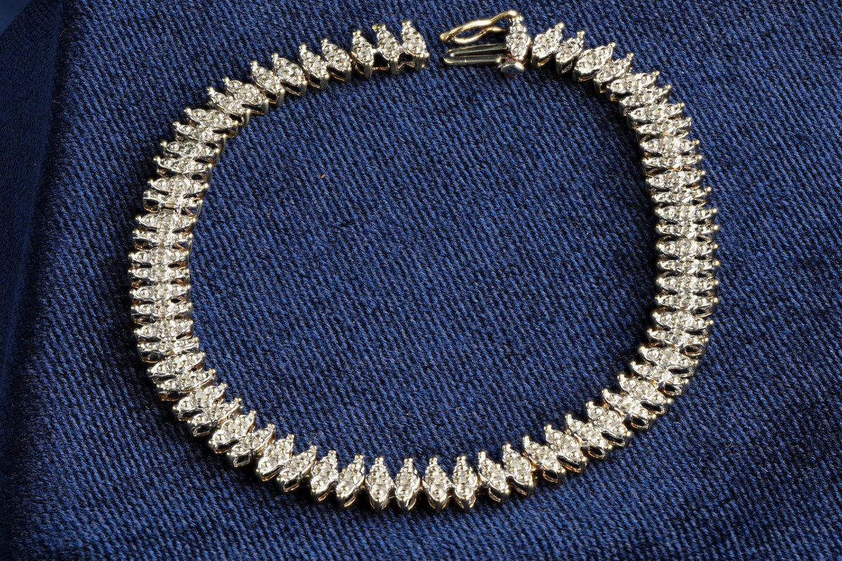 9ct gold diamond line bracelet, 68 brilliants, Sheffield hallmarked, 19.5 cm