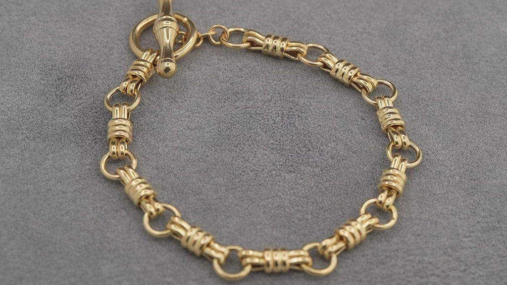 14ct yellow gold hay bale link bracelet with T-bar, 195mm